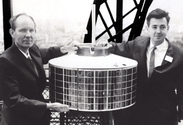 Thomas Hudspeth, left, Harold Rosen and Don Williams (not pictured) designed the electronics, propulsion and power system for a communications satellite.