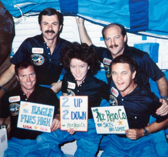 The Discovery "Eagle" crew that pulled off the recovery operations in orbit.  Front, left to right:  Pilot Dave Walker with Mission Specialists Anne Fisher and joe Allen.  Back row:  Mission Specialist Dale Gardner and Mission 51-A Commander Frederick "Rick" Hauck.